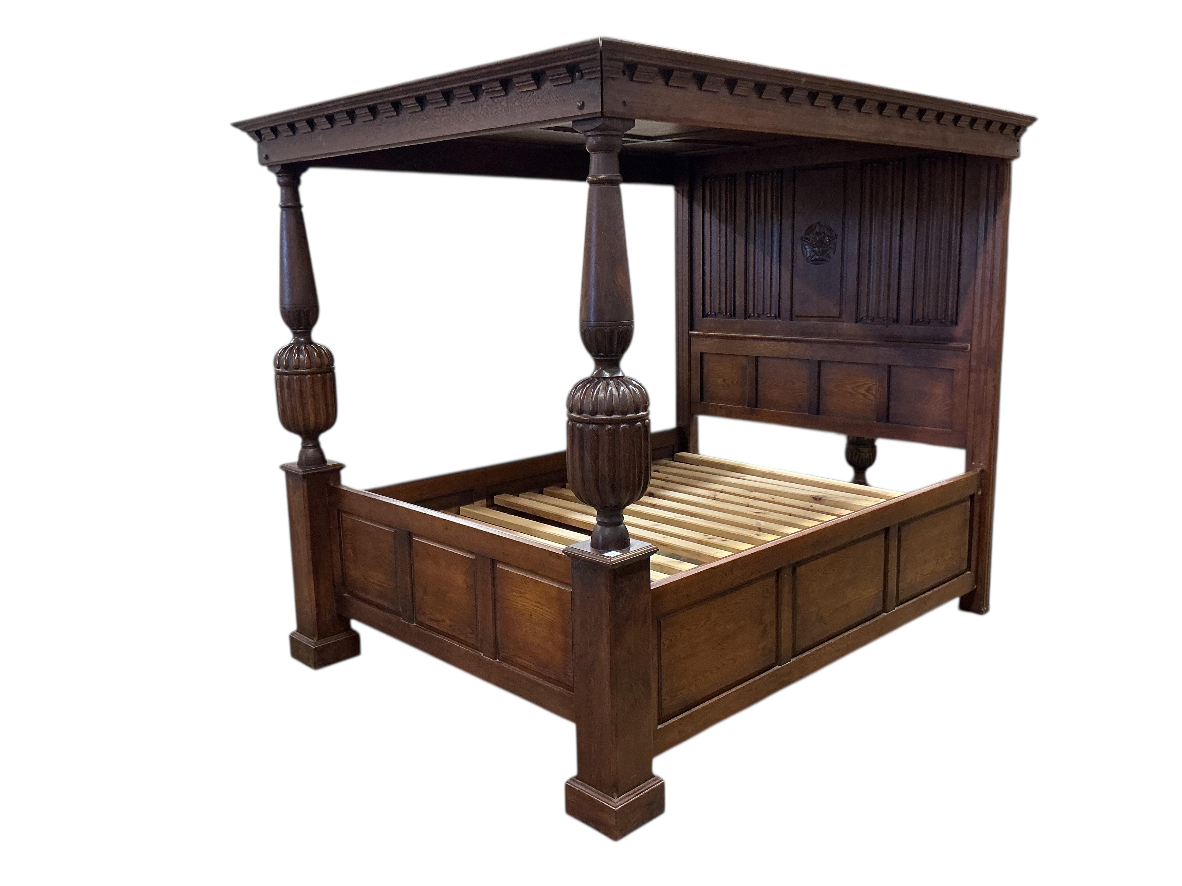 A reproduction Tudor style oak four poster bed, width 174cm, length 230cm, height 198cm